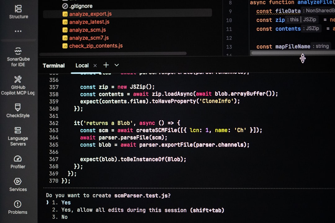Coding on a dark theme computer screen